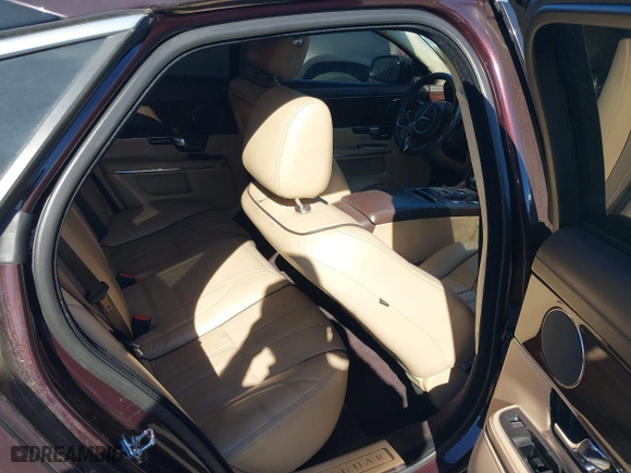 2011 Jaguar XJ with VIN SAJWA1CB8BLV05958, listed as a IAAI auction lot 40799422 with 80,193 mi miles. Bid and sale history available at carsss.com. Image 8.