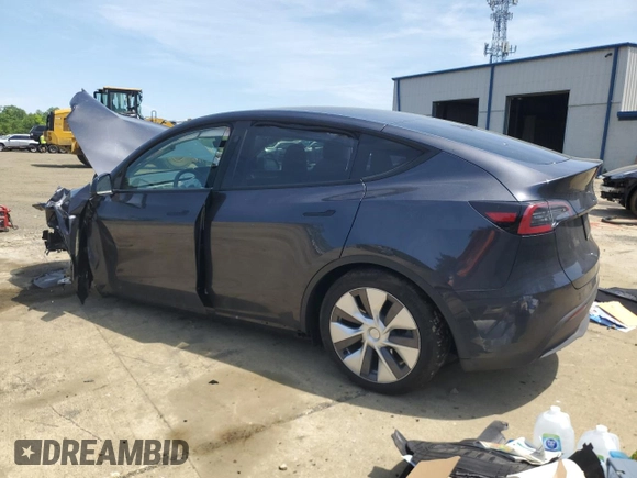 2024 Tesla Model Y with VIN 7SAYGDED6RF091715, listed as a Copart auction lot 56535585 with 23,120 mi miles and Salvage title. Bid and sale history available at DreamBid. Image 2.