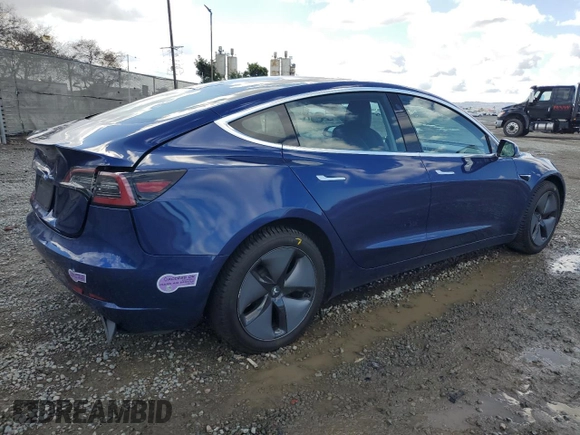 2019 Tesla Model 3 Mid Range with VIN 5YJ3E1EA8KF299456, listed as a Copart auction lot 48152695 with 27,144 mi miles and Salvage Title. Bid and sale history available at DreamBid. Image 3.