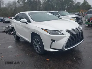 2017 Lexus RX with VIN 2T2BZMCA6HC077656, listed as a IAAI auction lot 41394175 with 80,986 mi miles. Bid and sale history available at carsss.com. Image 1.