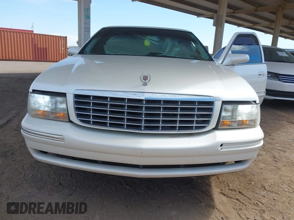 1999 Cadillac DeVille z VIN 1G6KD54YXXU794294, wystawiony jako IAAI lot #42141931 z przebiegiem 161 408 mil mil oraz . Historia ofert i sprzedaży dostępna na DreamBid. Obrazek 6.