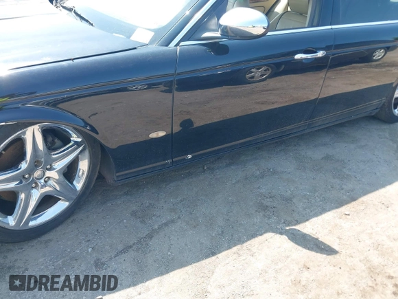 2007 Jaguar XJ Vanden Plas z VIN SAJWA82B87SH13560, wystawiony jako IAAI lot #42502145 z przebiegiem 211 075 mil mil oraz . Historia ofert i sprzedaży dostępna na DreamBid. Obrazek 6.