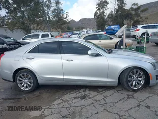 2018 Cadillac ATS Luxury RWD z VIN 1G6AB5RX6J0110860, wystawiony jako IAAI lot #41556662 z przebiegiem 63 886 mil mil oraz . Historia ofert i sprzedaży dostępna na DreamBid. Obrazek 14.