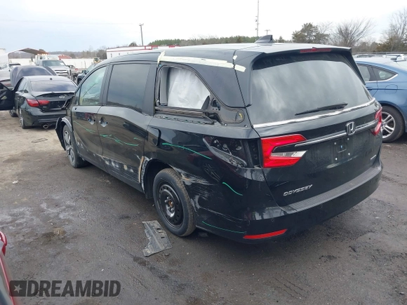 2023 Honda Odyssey Touring with VIN 5FNRL6H81PB068721, listed as a IAAI auction lot 41489618 with 20,202 mi miles and . Bid and sale history available at DreamBid. Image 3.