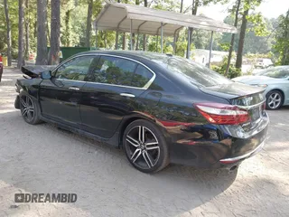 2017 Honda Accord Touring z VIN 1HGCR3F97HA044885, wystawiony jako IAAI lot #42603354 z przebiegiem 175 110 mil mil oraz . Historia ofert i sprzedaży dostępna na DreamBid. Obrazek 3.