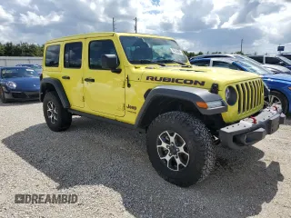 2022 Jeep Wrangler Unlimited Rubicon with VIN 1C4HJXFG3NW214174, listed as a Copart auction lot 74136484 with 5,292 mi miles and Salvage title. Bid and sale history available at DreamBid. Image 4.