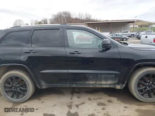 2018 Jeep Grand Cherokee Laredo E with VIN 1C4RJFAG3JC324434, listed as a IAAI auction lot 41812311 with 140,820 mi miles. Bid and sale history available at carsss.com. Image 13.