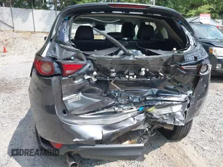 2020 Mazda CX-5 Grand Touring with VIN JM3KFBDM1L0821975, listed as a IAAI auction lot 40088794 with 68,895 mi miles and . Bid and sale history available at DreamBid. Image 20.