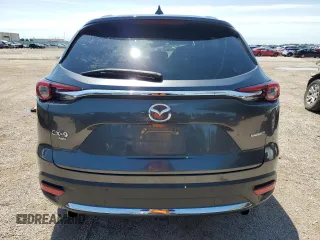 2023 Mazda CX-9 Grand Touring z VIN JM3TCBDY1P0643782, wystawiony jako Copart lot #59702665 z przebiegiem 83 245 mil mil oraz Nie do naprawy • Non repairable. Historia ofert i sprzedaży dostępna na DreamBid. Obrazek 6.
