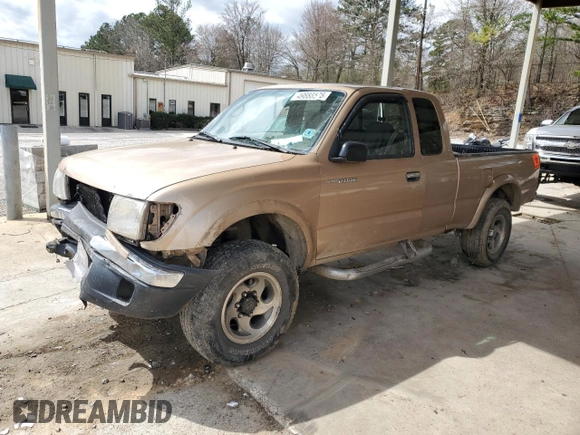 1999 Toyota Tacoma with VIN 4TAWN72NXXZ563507, listed as a Copart auction lot 49888575 with 387,818 mi miles and Salvage title. Bid and sale history available at DreamBid. Image 1.