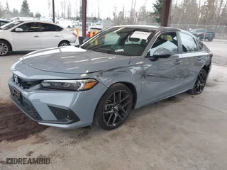 2023 Honda Civic Hatchback Sport Touring with VIN 19XFL1H83PE008953, listed as a IAAI auction lot 41829838 with 23,065 mi miles. Bid and sale history available at carsss.com. Image 18.