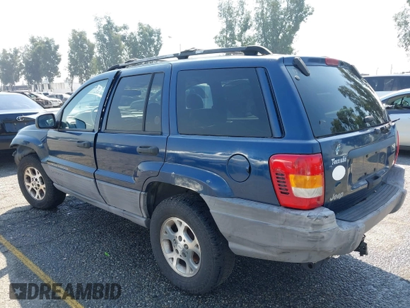 1999 Jeep Grand Cherokee Laredo z VIN 1J4G258S1XC787295, wystawiony jako IAAI lot #40450680 z przebiegiem Nie podano mil oraz . Historia ofert i sprzedaży dostępna na DreamBid. Obrazek 3.