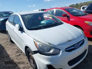 2014 Hyundai Accent GLS with VIN KMHCT4AE4EU590415, listed as a IAAI auction lot 41877817 with 169,285 mi miles. Bid and sale history available at carsss.com. Image 6.