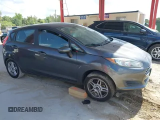 2019 Ford Fiesta SE with VIN 3FADP4EJ9KM156565, listed as a IAAI auction lot 42164212 with 133,759 mi miles and . Bid and sale history available at DreamBid. Image 13.