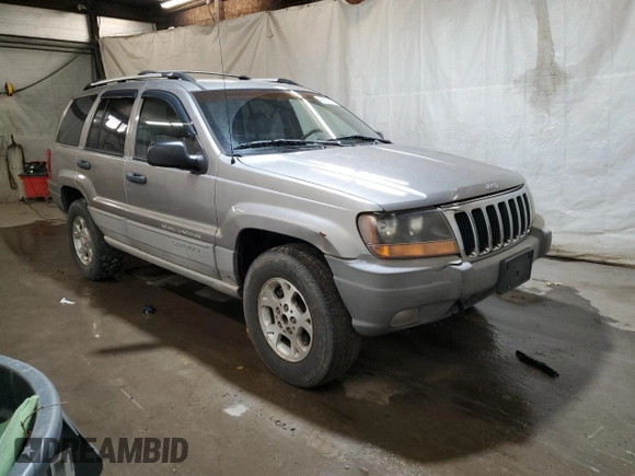 1999 Jeep Grand Cherokee Laredo with VIN 1J4GW58N0XC686845, listed as a Copart auction lot 48877805 with 155,908 mi miles and Clean title. Bid and sale history available at DreamBid. Image 4.