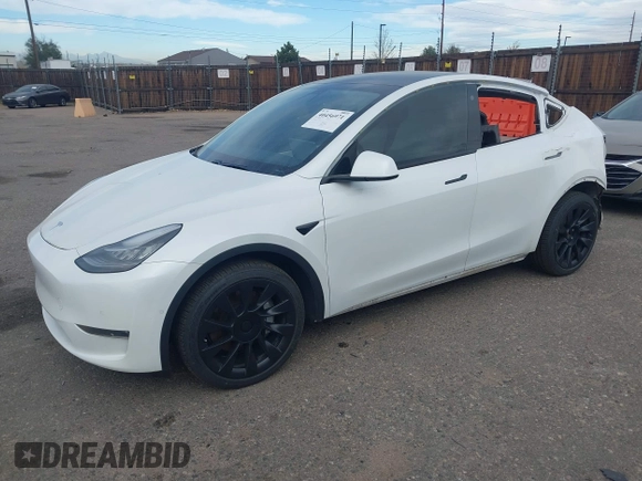 2021 Tesla Model Y Long Range with VIN 5YJYGDEE2MF074246, listed as a IAAI auction lot 40456971 with 94,527 mi miles. Bid and sale history available at carsss.com. Image 2.
