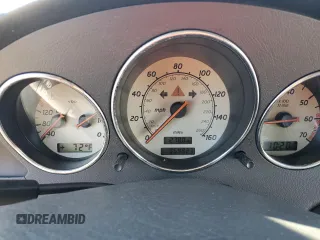 1999 Mercedes-Benz SLK-Class with VIN WDBKK47F4XF129689, listed as a Copart auction lot 75311624 with 54,923 mi miles and Salvage Title. Bid and sale history available at carsss.com. Image 9.