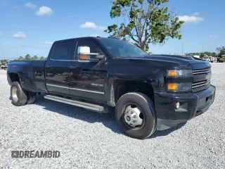 2018 Chevrolet Silverado 3500HD LTZ z VIN 1GC4K0EYXJF290952, wystawiony jako Copart lot #51465495 z przebiegiem Nie podano mil oraz Tytuł czysty. Historia ofert i sprzedaży dostępna na DreamBid. Obrazek 4.