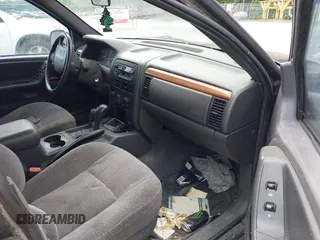 1999 Jeep Grand Cherokee Laredo with VIN 1J4GW58S0XC524798, listed as a IAAI auction lot 42761040 with 173,792 mi miles and . Bid and sale history available at DreamBid. Image 5.