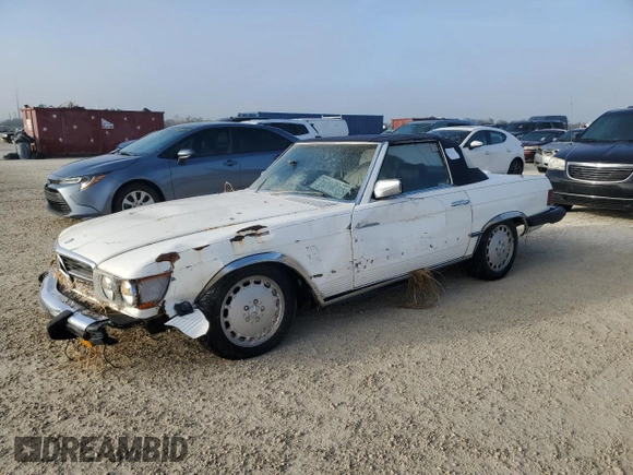 1980 Mercedes-Benz SL with VIN 10704412062529, listed as a Copart auction lot 77941784 with Not provided miles and Salvage title. Bid and sale history available at DreamBid. Image 1.