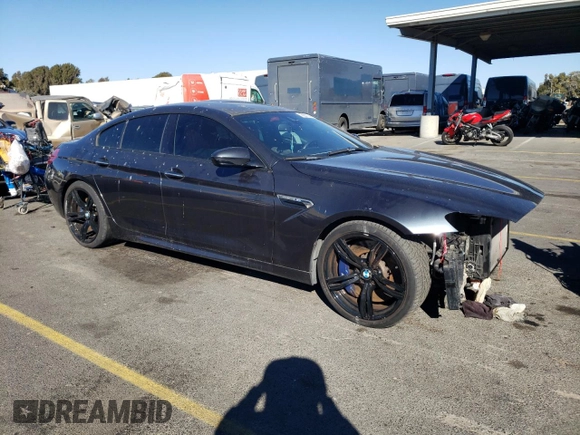 2015 BMW M6 z VIN WBS6C9C5XFD467854, wystawiony jako Copart lot #78871744 z przebiegiem 55 789 mil mil oraz Szkody całkowita. Historia ofert i sprzedaży dostępna na DreamBid. Obrazek 4.