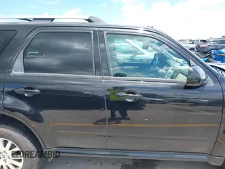 2011 Mercury Mariner Premier with VIN 4M2CN8HGXBKJ07489, listed as a IAAI auction lot 42574942 with 163,786 mi miles and . Bid and sale history available at DreamBid. Image 13.