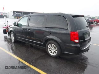 2015 Dodge Grand Caravan SXT with VIN 2C4RDGCG8FR556861, listed as a IAAI auction lot 42224948 with 110,797 mi miles and . Bid and sale history available at DreamBid. Image 3.
