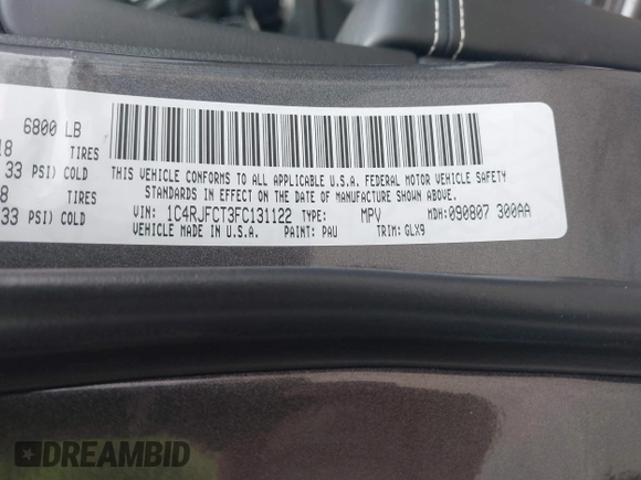 2015 Jeep Grand Cherokee Overland with VIN 1C4RJFCT3FC131122, listed as a IAAI auction lot 41513892 with 125,765 mi miles. Bid and sale history available at carsss.com. Image 9.