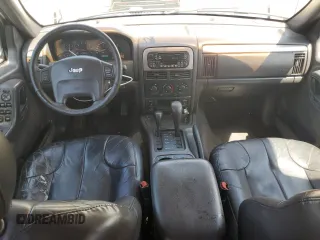2001 Jeep Grand Cherokee Laredo z VIN 1J4GW48S61C537640, wystawiony jako Copart lot #58266135 z przebiegiem 188 475 mil mil oraz Szkoda całkowita • Salvage title. Historia ofert i sprzedaży dostępna na DreamBid. Obrazek 8.