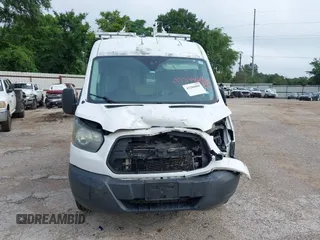 2015 Ford Transit Cargo with VIN 1FTNR1CM2FKB29029, listed as a IAAI auction lot 42286089 with 130,845 mi miles and . Bid and sale history available at DreamBid. Image 12.