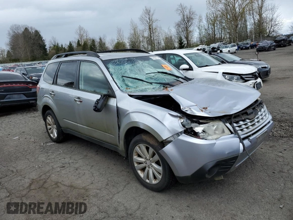 2012 Subaru Forester X Premium with VIN JF2SHADC2CH407983, listed as a Copart auction lot 51628125 with 147,271 mi miles and Salvage Title. Bid and sale history available at DreamBid. Image 4.