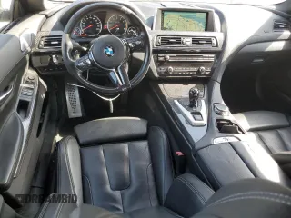 2015 BMW M6 z VIN WBS6C9C51FD467872, wystawiony jako Copart lot #79107574 z przebiegiem 79 139 mil mil oraz Szkoda całkowita • Salvage title. Historia ofert i sprzedaży dostępna na DreamBid. Obrazek 8.