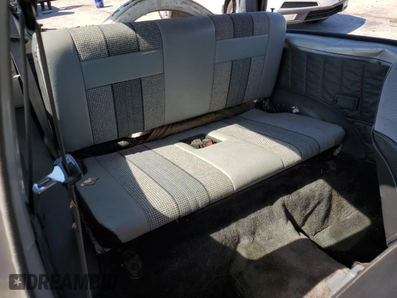 1991 Geo Tracker z VIN 2CNBJ18U3M6909006, wystawiony jako Copart lot #73638944 z przebiegiem 65 033 mil mil oraz Tytuł czysty. Historia ofert i sprzedaży dostępna na DreamBid. Obrazek 11.