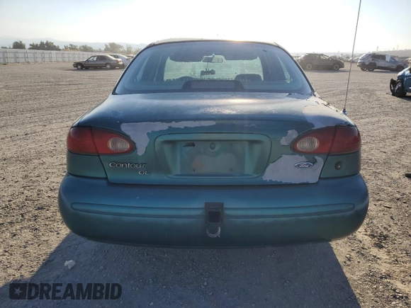 1997 Ford Contour z VIN 3FALP6536VM113346, wystawiony jako Copart lot #70036024 z przebiegiem 115 084 mil mil oraz Czysty tytuł • Clean title. Historia ofert i sprzedaży dostępna na DreamBid. Obrazek 6.