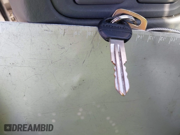 2000 Honda Civic LX z VIN 1HGEJ6679YL019958, wystawiony jako IAAI lot #42328269 z przebiegiem 217 961 mil mil oraz . Historia ofert i sprzedaży dostępna na DreamBid. Obrazek 11.