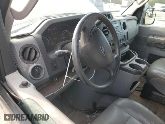 2010 Ford Econoline Passenger XL with VIN 1FMNE1BWXADA30935, listed as a Copart auction lot 77912734 with 153,775 mi miles and Salvage Title. Bid and sale history available at DreamBid. Image 8.