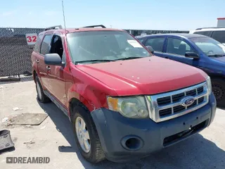2010 Ford Escape XLT with VIN 1FMCU9D78AKC59561, listed as a IAAI auction lot 42025027 with 238,545 mi miles. Bid and sale history available at carsss.com. Image 1.