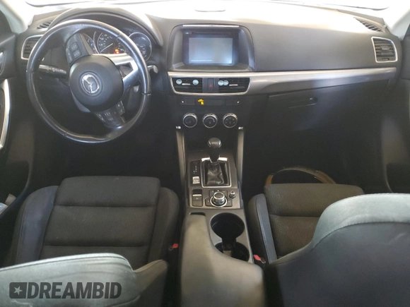 2016 Mazda CX-5 Touring с VIN JM3KE4CY8G0851144, выставлен на аукционе Copart как лот 62594925 с пробегом 178 741 миль миль и Чистый • Clean title. История ставок и продаж доступна на DreamBid. Изображение 8.