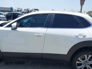 2021 Mazda CX-30 Select with VIN 3MVDMBBL9MM313039, listed as a IAAI auction lot 42575424 with 21,083 mi miles and . Bid and sale history available at DreamBid. Image 14.