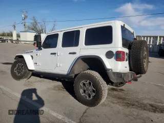 2023 Jeep Wrangler Rubicon Farout с VIN 1C4JJXFM2PW588219, выставлен на аукционе Copart как лот 77599774 с пробегом 38 914 миль миль и Списание • Salvage title. История ставок и продаж доступна на DreamBid. Изображение 2.
