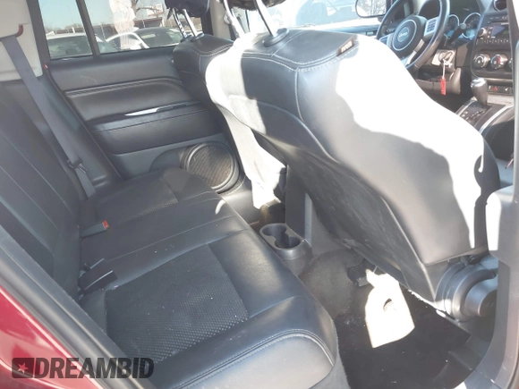 2016 Jeep Compass Latitude with VIN 1C4NJDEB1GD662807, listed as a IAAI auction lot 41161996 with 128,030 mi miles. Bid and sale history available at carsss.com. Image 8.
