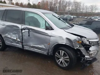 2016 Honda Pilot EX with VIN 5FNYF6H34GB013011, listed as a IAAI auction lot 41127682 with 178,440 mi miles. Bid and sale history available at carsss.com. Image 6.