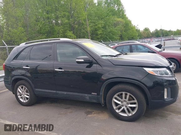 2015 Kia Sorento LX with VIN 5XYKTDA63FG570085, listed as a IAAI auction lot 42031786 with 181,652 mi miles and . Bid and sale history available at DreamBid. Image 14.