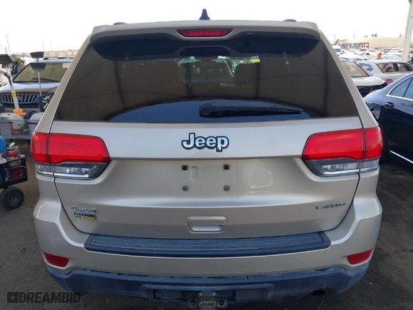 2014 Jeep Grand Cherokee Laredo with VIN 1C4RJFAG7EC380544, listed as a IAAI auction lot 42021130 with 166,589 mi miles. Bid and sale history available at carsss.com. Image 16.
