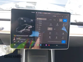2020 Tesla Model 3 Standard Range Plus z VIN 5YJ3E1EA6LF703159, wystawiony jako IAAI lot #42099718 z przebiegiem 30 175 mil mil oraz . Historia ofert i sprzedaży dostępna na DreamBid. Obrazek 17.