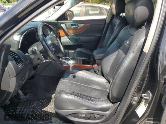 2014 Infiniti QX70 z VIN JN8CS1MU4EM451883, wystawiony jako Copart lot #61744725 z przebiegiem 60 393 mil mil oraz Czysty tytuł • Clean title. Historia ofert i sprzedaży dostępna na DreamBid. Obrazek 7.