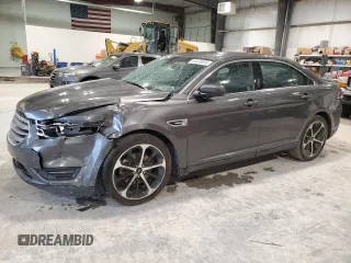 2015 Ford Taurus SEL z VIN 1FAHP2E81FG148673, wystawiony jako Copart lot #59439855 z przebiegiem 106 727 mil mil oraz Szkoda całkowita • Salvage title. Historia ofert i sprzedaży dostępna na DreamBid. Obrazek 1.