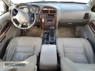 1998 Infiniti QX4 z VIN JNRAR05Y9WW027079, wystawiony jako Copart lot #72374434 z przebiegiem 206 587 mil mil oraz Szkody całkowita. Historia ofert i sprzedaży dostępna na DreamBid. Obrazek 8.