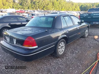 2003 Ford Crown Victoria LX z VIN 2FAFP74WX3X136631, wystawiony jako IAAI lot #42269451 z przebiegiem 369 733 mil mil oraz . Historia ofert i sprzedaży dostępna na DreamBid. Obrazek 4.