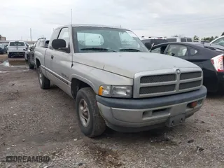 1999 Dodge Ram 1500 with VIN 3B7HC13Y6XM595476, listed as a IAAI auction lot 41360918 with 133,163 mi miles. Bid and sale history available at carsss.com. Image 1.